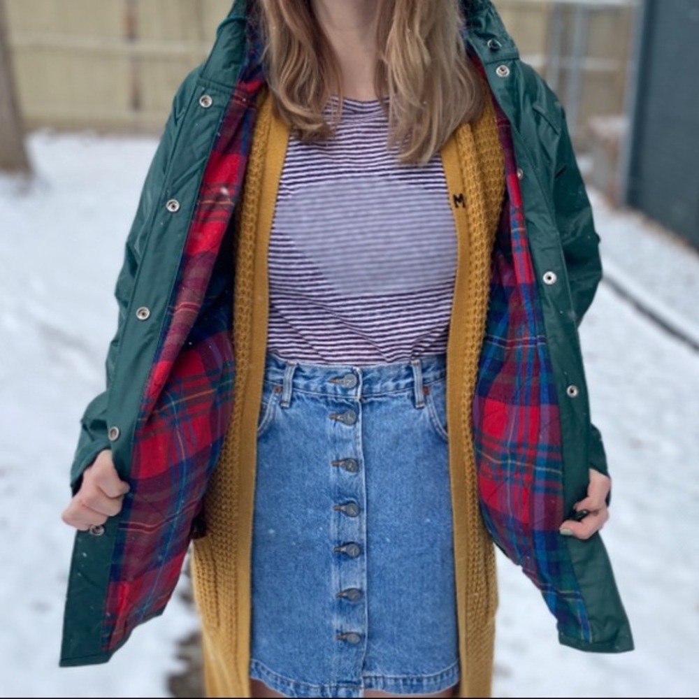 Hunters green raincoat with red flannel interior
